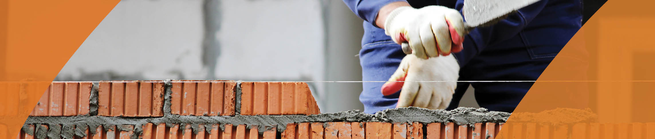 Worker laying bricks