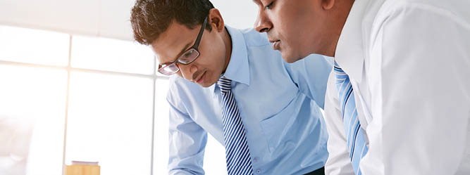 Two men collaborating